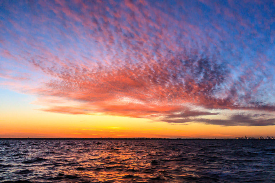 Sunset over Felixstowe from the North Sea