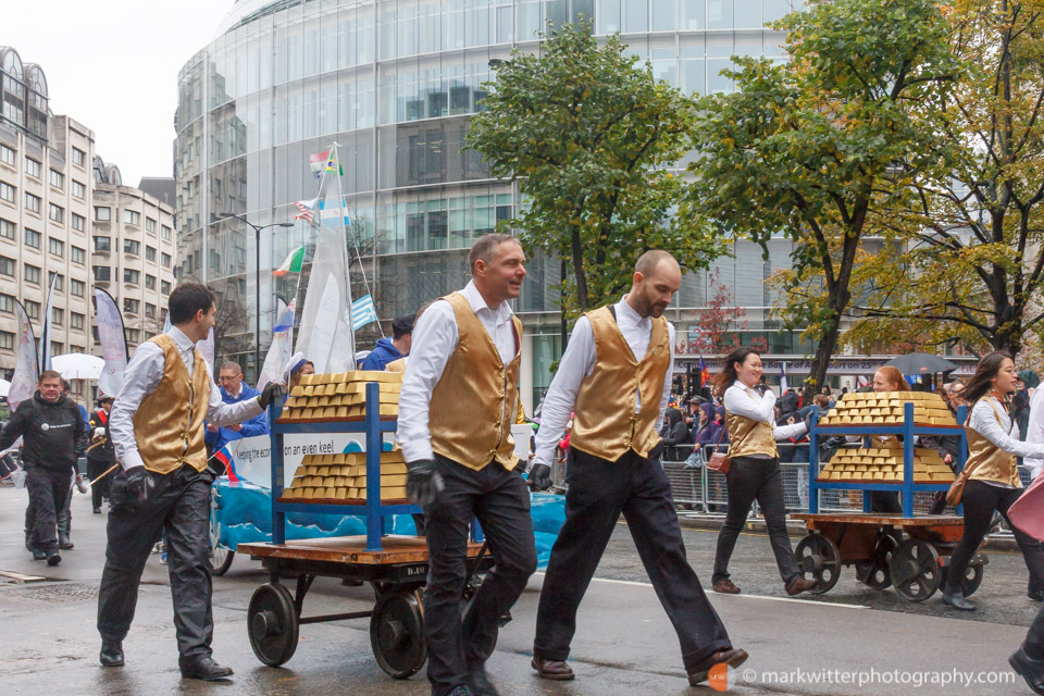 Bank of England staff pulling a trolley of gold bars